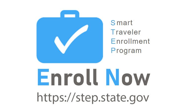Logo for STEP (Smart Traveler Enrollment Program) showing a blue suitcase with checkmark and "Enroll Now" text with website URL